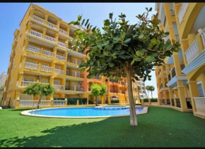 Sunny ground floor apartment with a large terrace and direct access to the pool